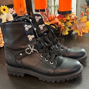 Black Leather Combat Boots with Silver Accents Calvin Klein. Darling boot.
